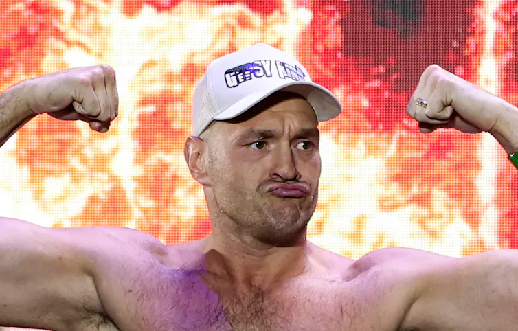 Tyson Fury pouting in baseball cap.