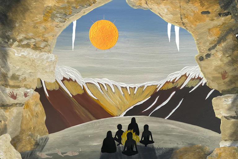 A group of people look out of a cave.