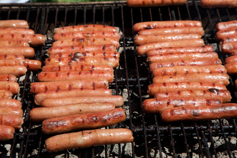 Sausages on a barbecue.