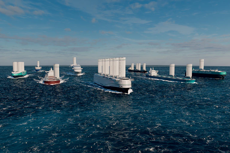 Concept graphic of a fleet of wind-powered ships on blue sea