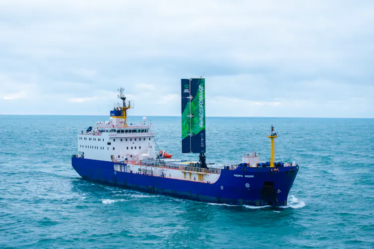big container ship with solid 'sail'