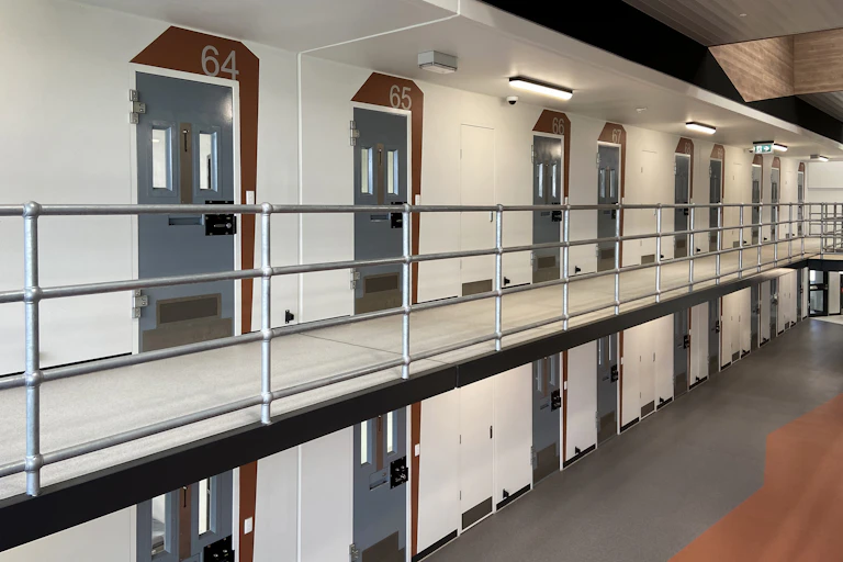 Rows of numbered prison cells