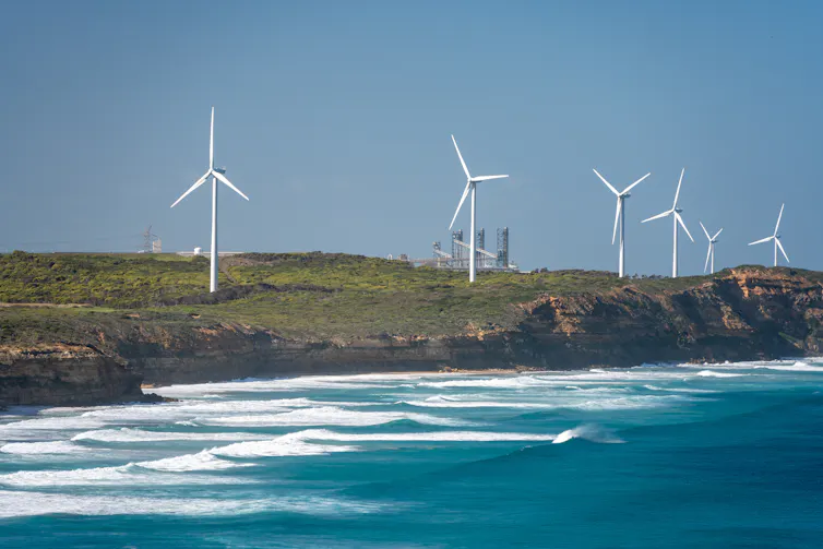 wind turbines pictured near an aluminium smelter in Victoria.