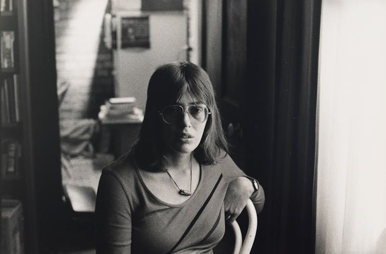 A young woman poses for a photo.