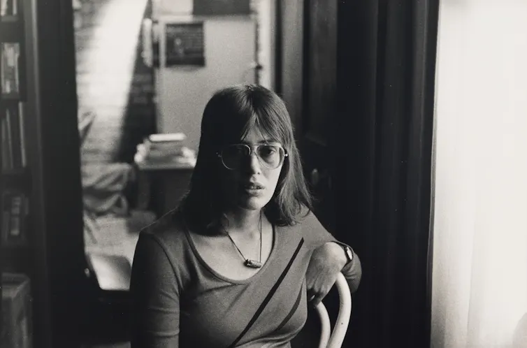 A young woman poses for a photo.