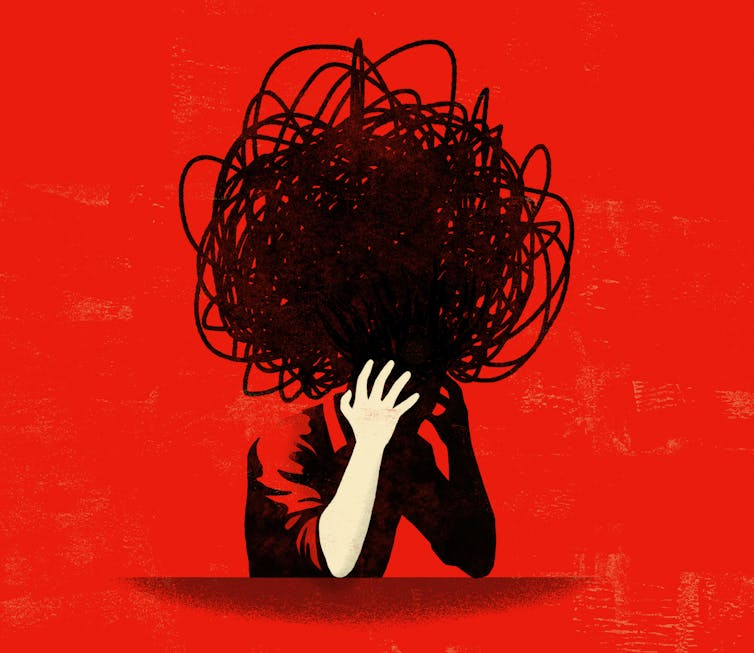 man with head in hands with a big scribble over his head