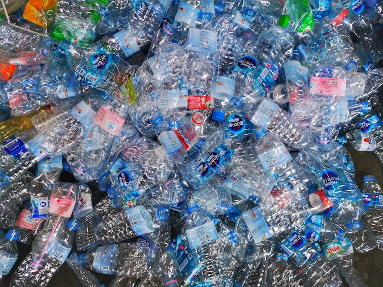 A pile of used plastic bottles.