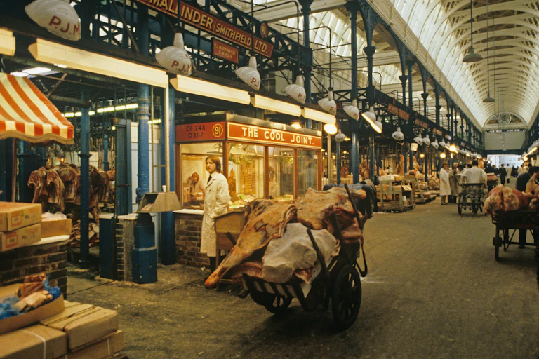 A typical day inside Smithfield's Victorian meant market halls.