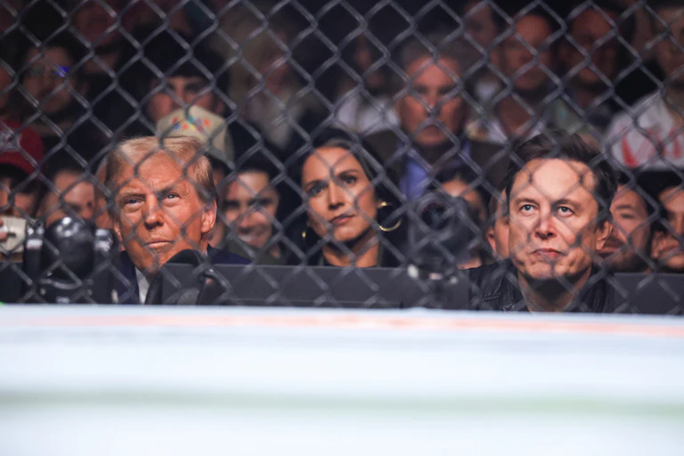 Donald Trump, Tulsi Gabbard and Elon Musk sit ringside.