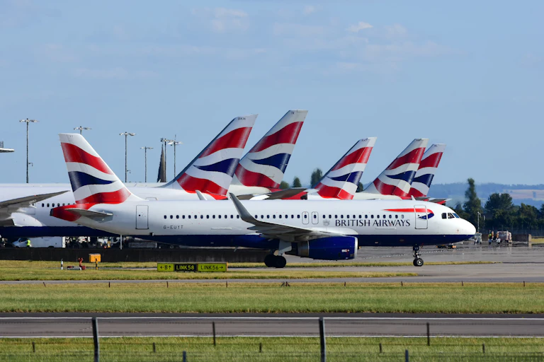 Lots of british airways planes at heathrow airport