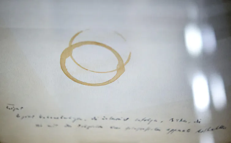 A red wine stain on a poem manuscript by Paul Celan.