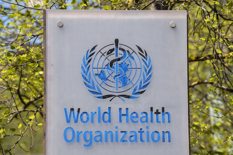 The logo of the World Health Organization on a sign outside its headquarters in Geneva, Switzerland