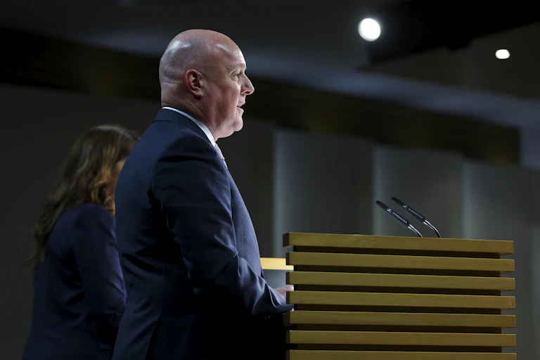 Luxon speaking at press conference
