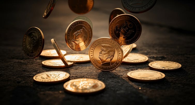 Gold coins with a man's head on them.