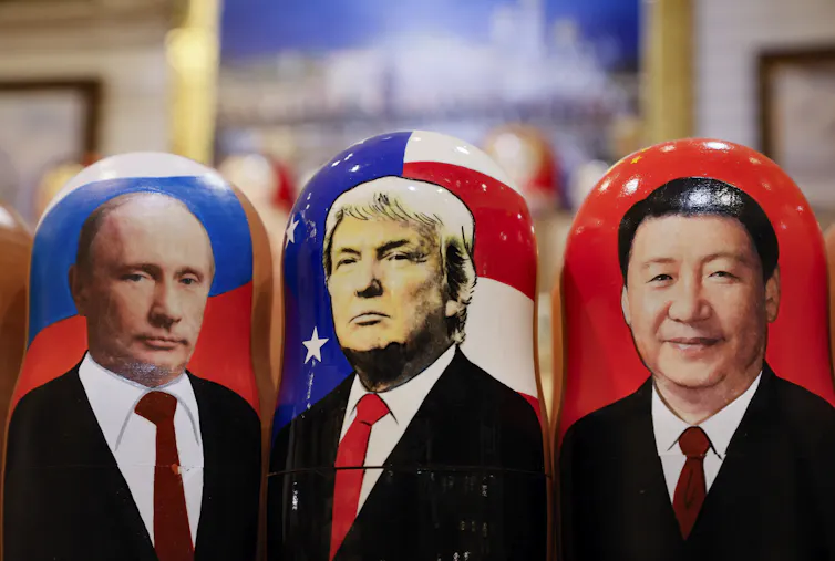 Russian dolls depicting Vladimir Putin, Donald Trump and Xi Jinping on display in a gift shop in Moscow.