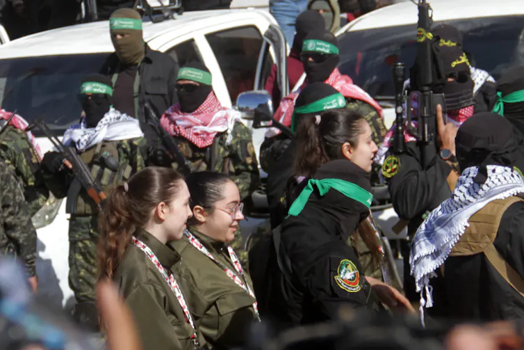 Hamas fighters at the handover of Israeli hostages, January 2025.