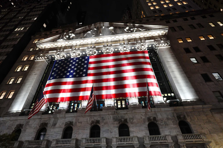 US Stock Exchange covered in US flag.