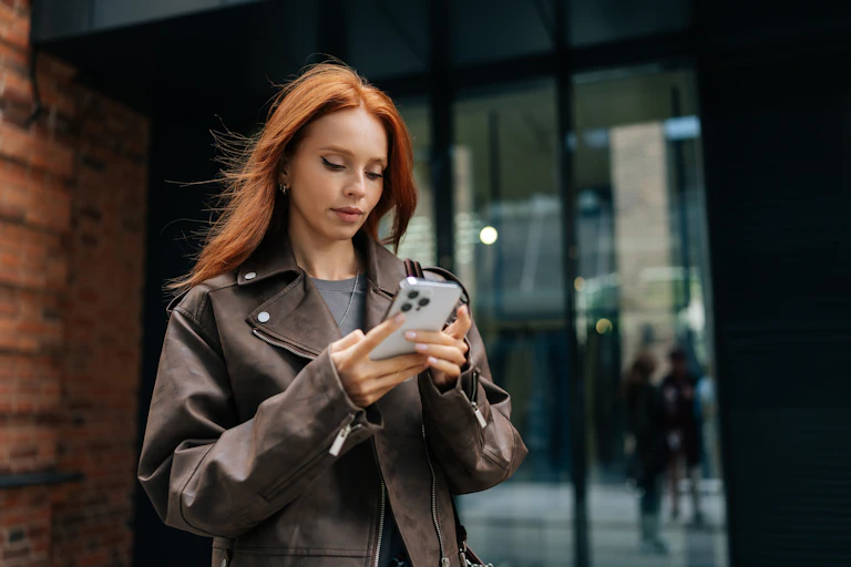 A young woman using a smartphone.