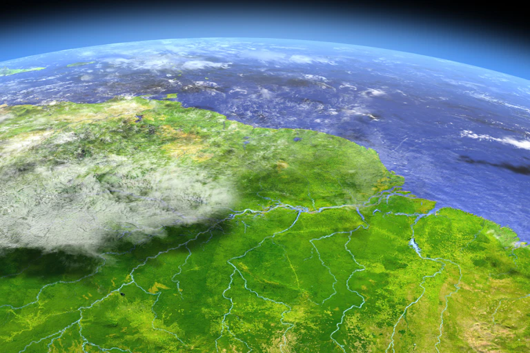 satellite image of green land, blue sea, white clouds