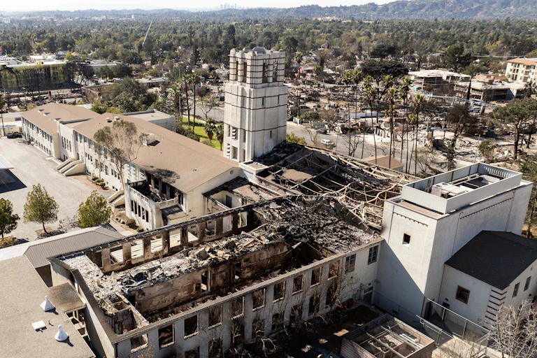A burned school building in Los Angeles is seen from above.