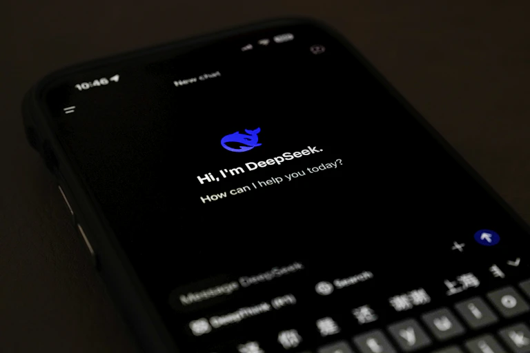 a smartphone screen showing text and a small icon of a blue whale