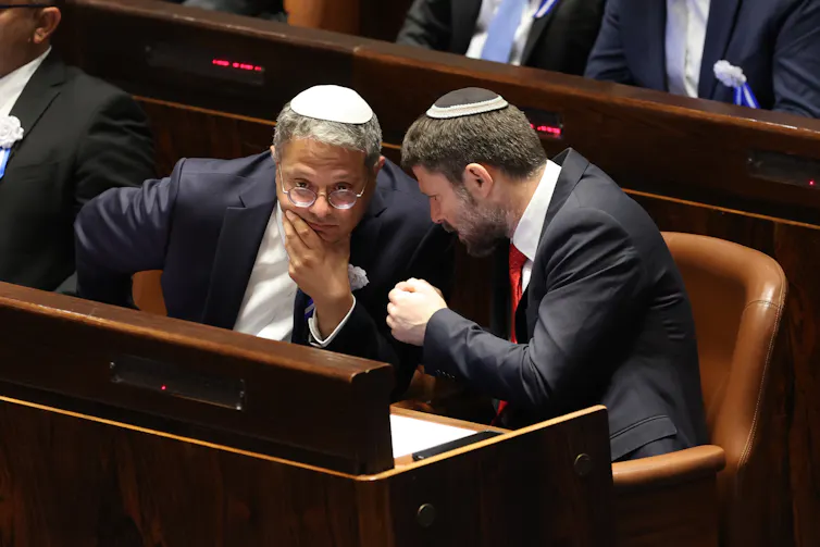 Itamar ben Gvir (L) and Bezalel Smotrich (R) in the Knesset in November 2022.