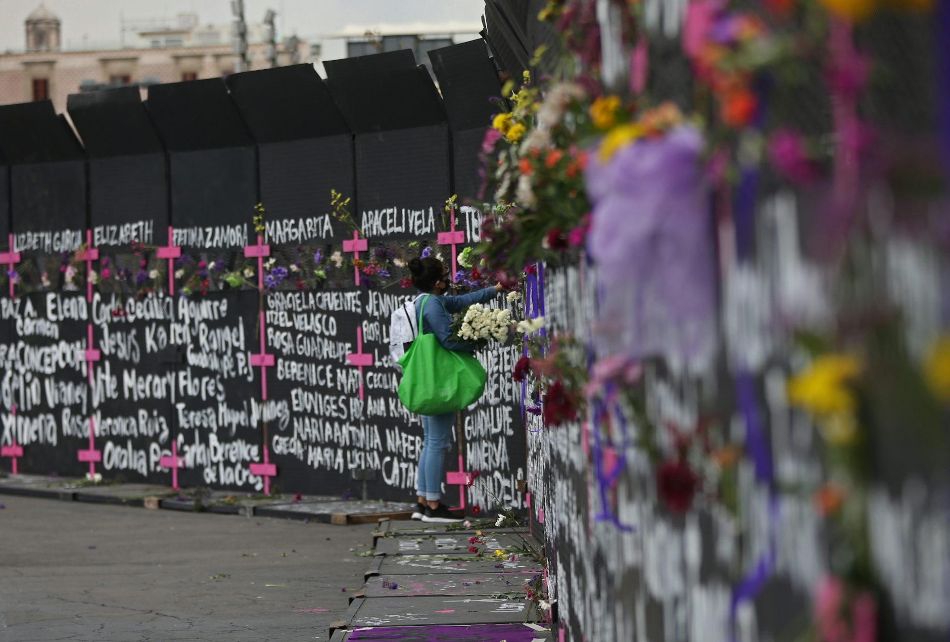 Wall with names of victims of femicides.