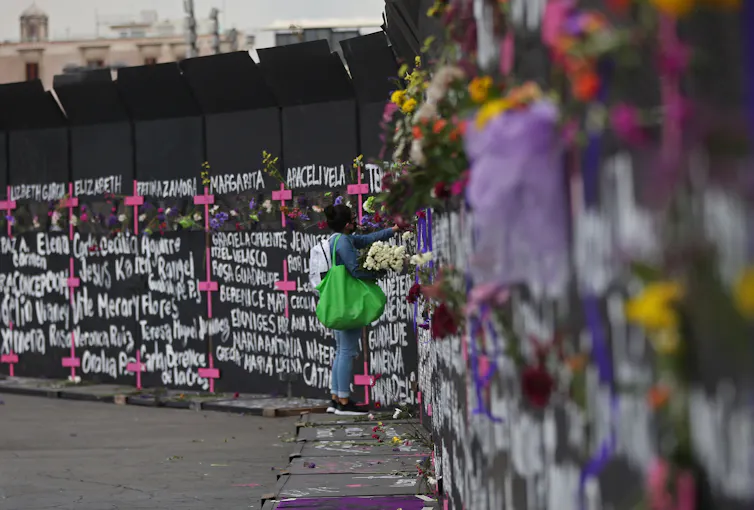 Wall with names of victims of femicides.