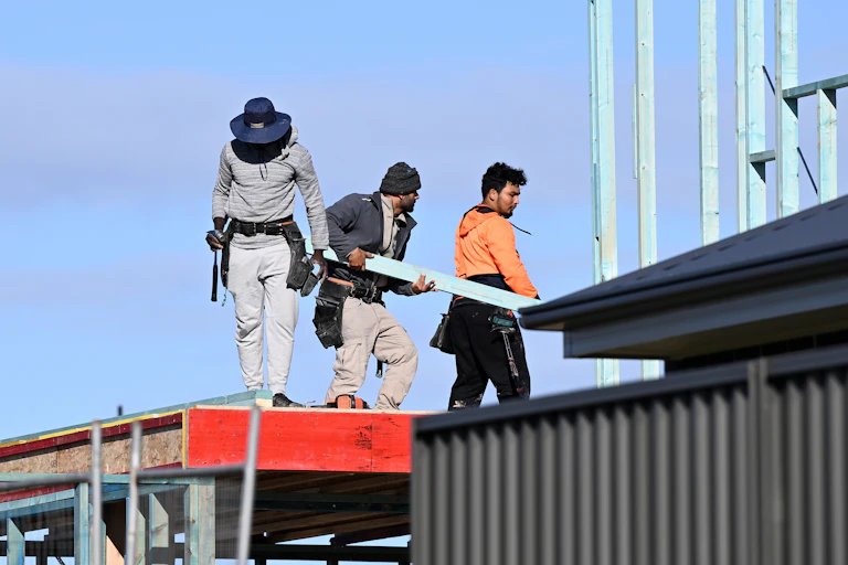 Building workers on a construction site