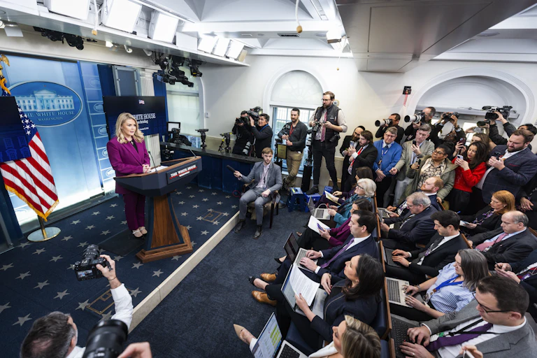 White House press secretary Karoline Leavitt addressing journalists in the James Brady press room.