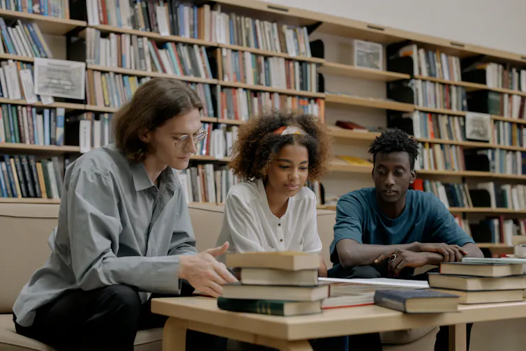 Students seen in discussion.
