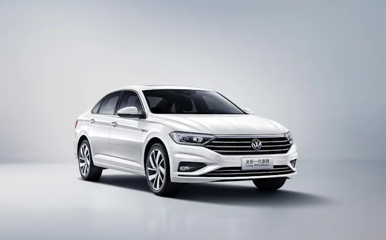 A white Volkswagen sedan