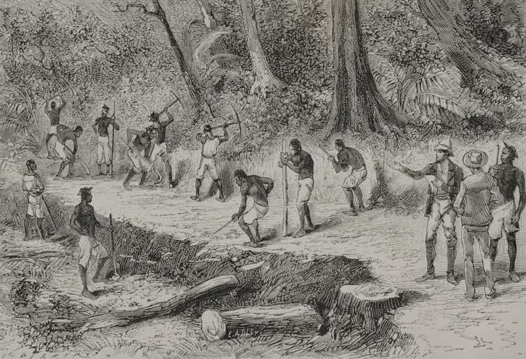An illustration of European men in uniform overseeing labour by shirtless African men.