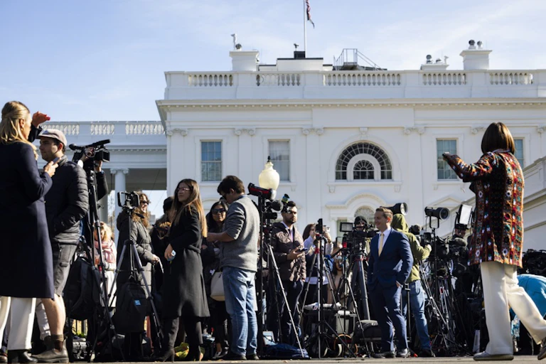 Media collected outside the White House.