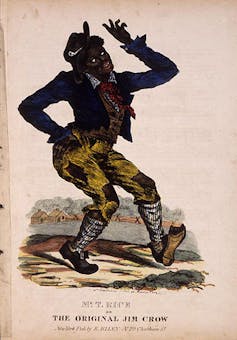 An image of a man in blackface dancing.