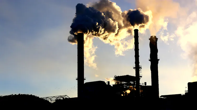 steam billowing from stacks