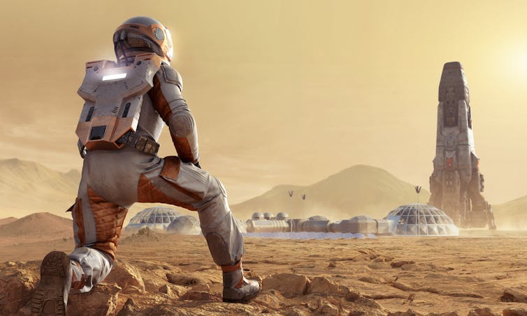 An illustration of an astronaut looking at a base camp on Mars.