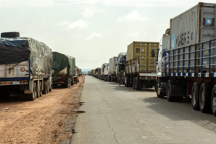 A queue of trucks waiting at the border between Benin and Niger.