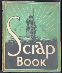 The cover of an old-fashioned scrapbook showing a clipper at sea against a green sky.