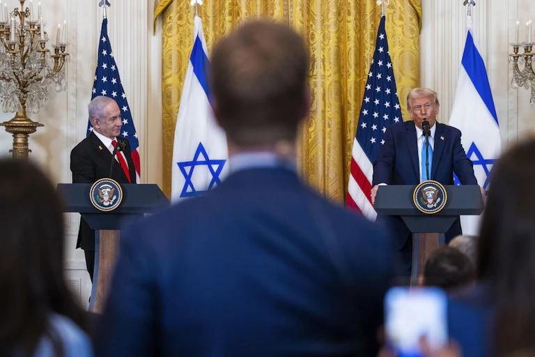 Donald Trump and Benjamin Netanyahu speak during a press conference.