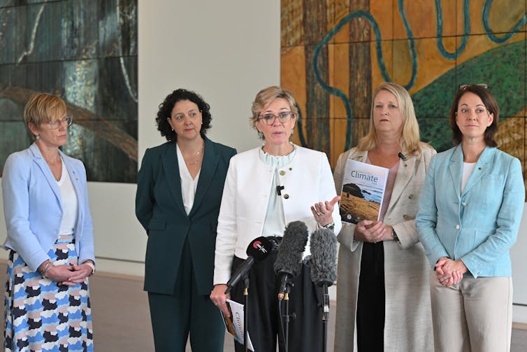 Five Teal MPs speaking with the media in Parliament House