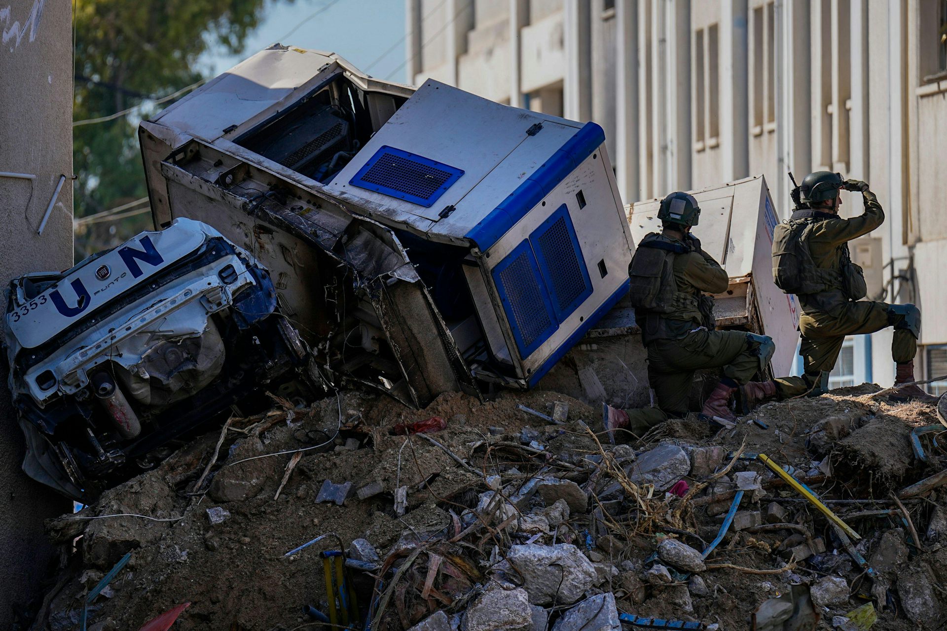The remains of an UNRWA truck on a pile of rubble in Gaza, February 2024.