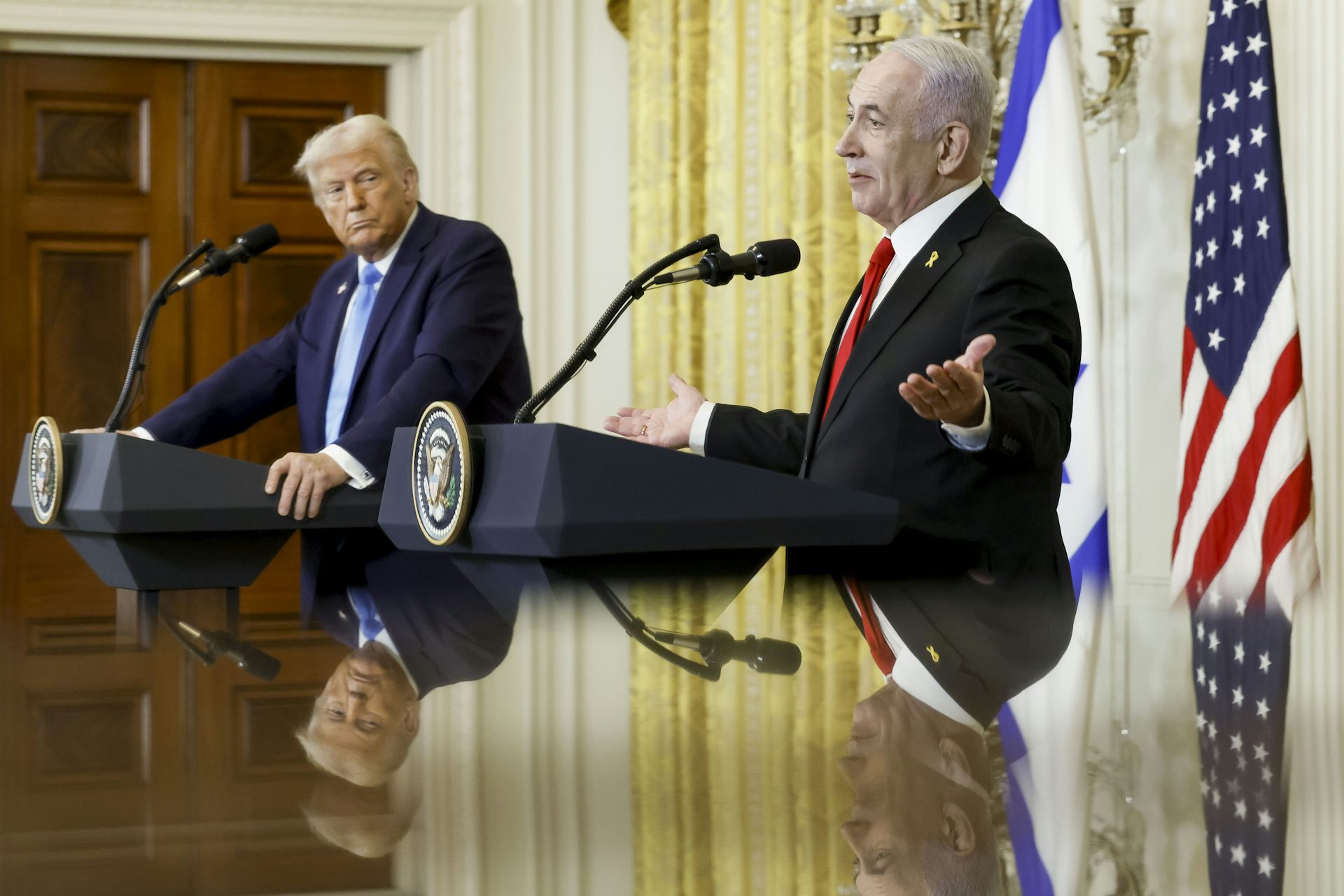 Trump and Netanyahu speak at a press conference.
