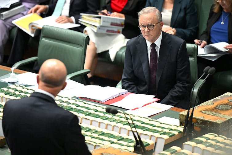 Prime Minister Anthony Albanese and Opposition Leader Peter Dutton facing each other in Parliament