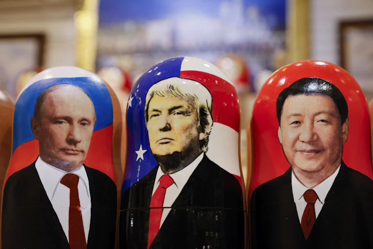Matryoska dolls featuring images of Vladimir Putin, Donald Trump and Xi Jinping.