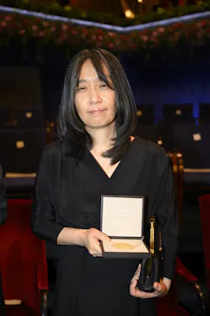 Han Kang with her Nobel.