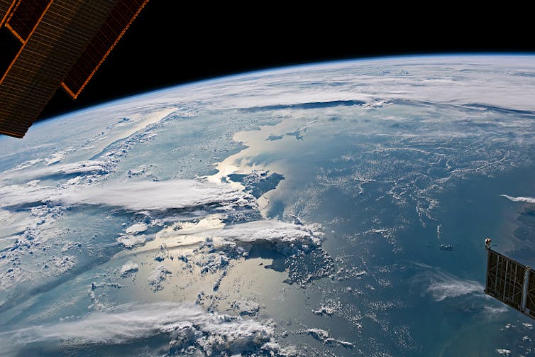 A view of Earth with clouds over the Indian Ocean.