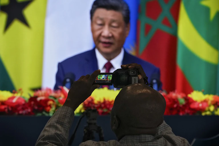 Man records a live speech.