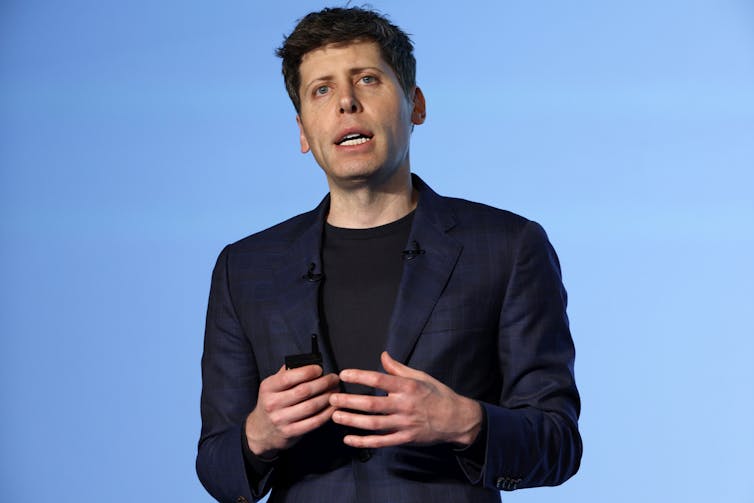 Sam Altman addressing an audience.