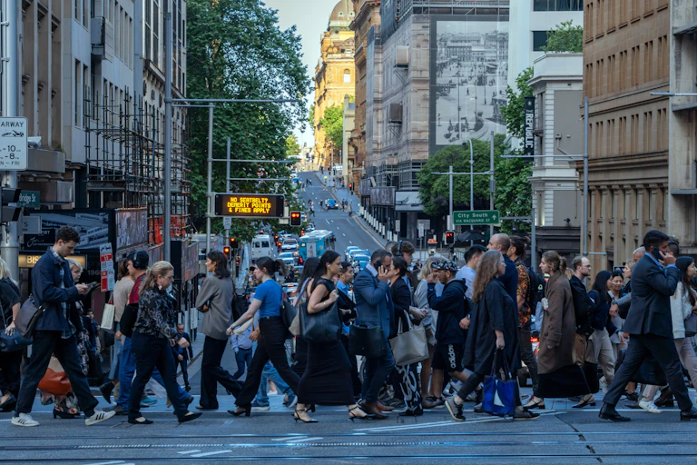A crowded pedestrian crossing in a city